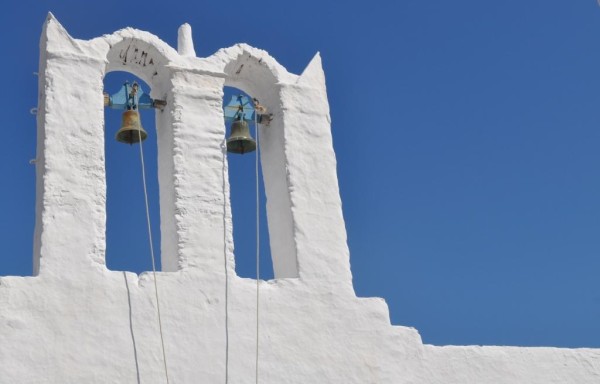 The theme of blinding white, saturated blue, and religions runs through the Greek Islands. The lime based whitewash has antibacterial properties; the white color helps reflect the heat and keep the houses cool. 
