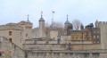 Skyline of the Tower of London showing light coloured walls and many towers