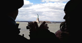 Tourists aboard Staten Island Ferry